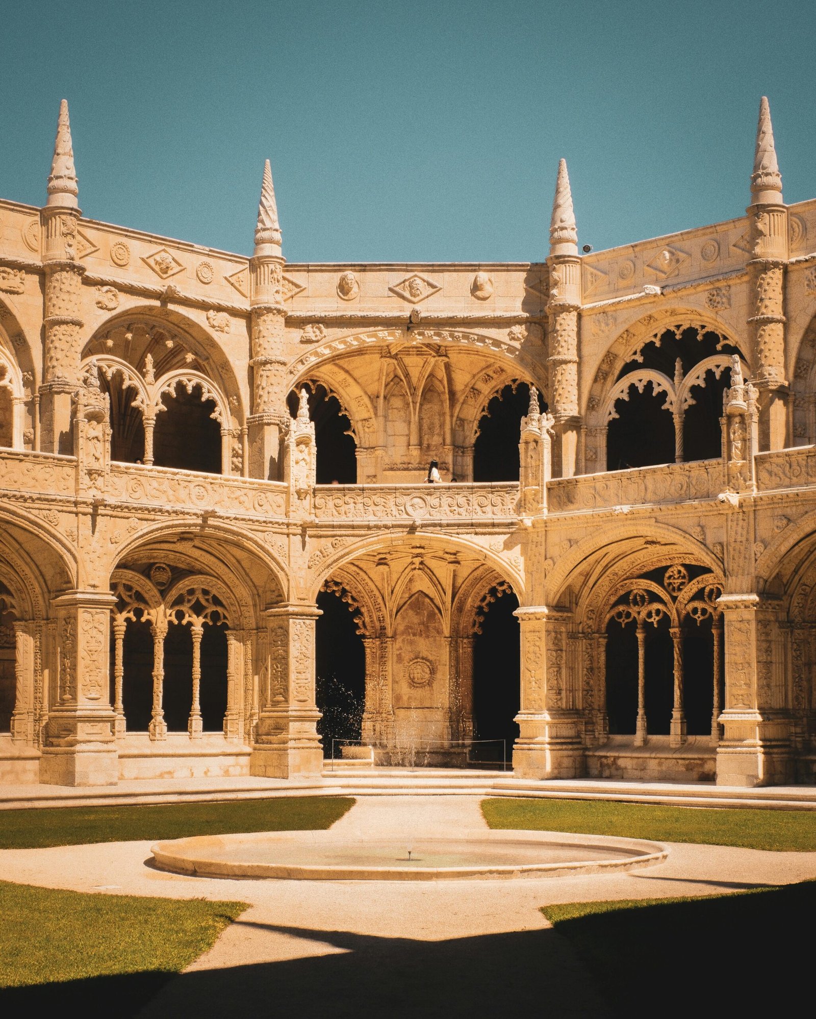 Explore the stunning Manueline architecture of Jerónimos Monastery in Lisbon, Portugal, a UNESCO World Heritage Site.